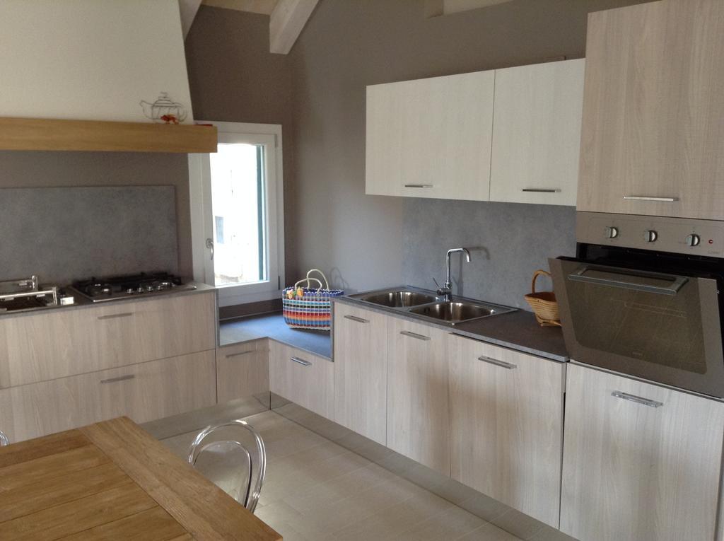 Casa Dexterhouse Vista Laguna Кіоджа Номер фото