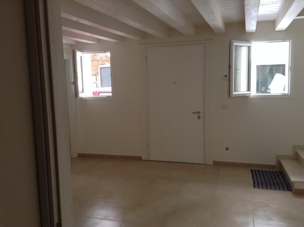Casa Dexterhouse Vista Laguna Кіоджа Номер фото