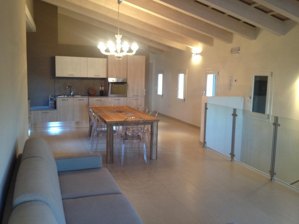 Casa Dexterhouse Vista Laguna Кіоджа Номер фото