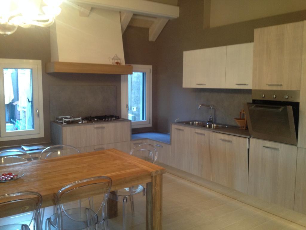 Casa Dexterhouse Vista Laguna Кіоджа Номер фото